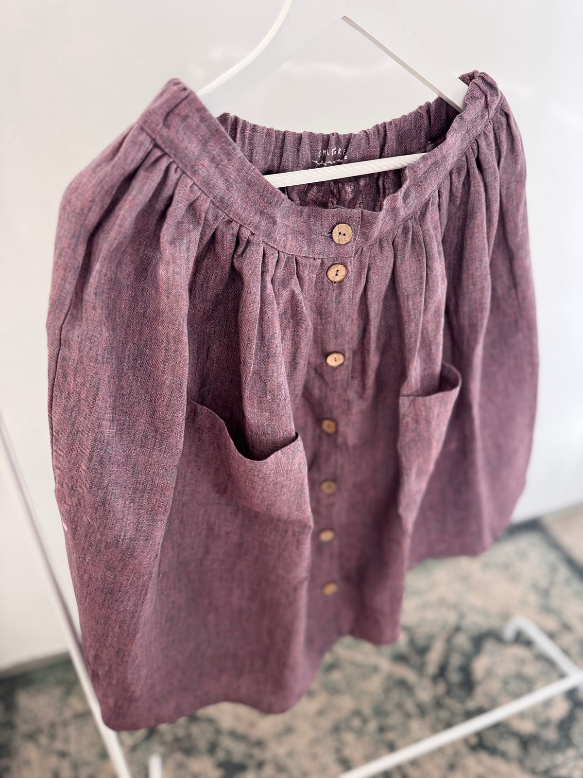 Skirt with buttons, purple melange, M